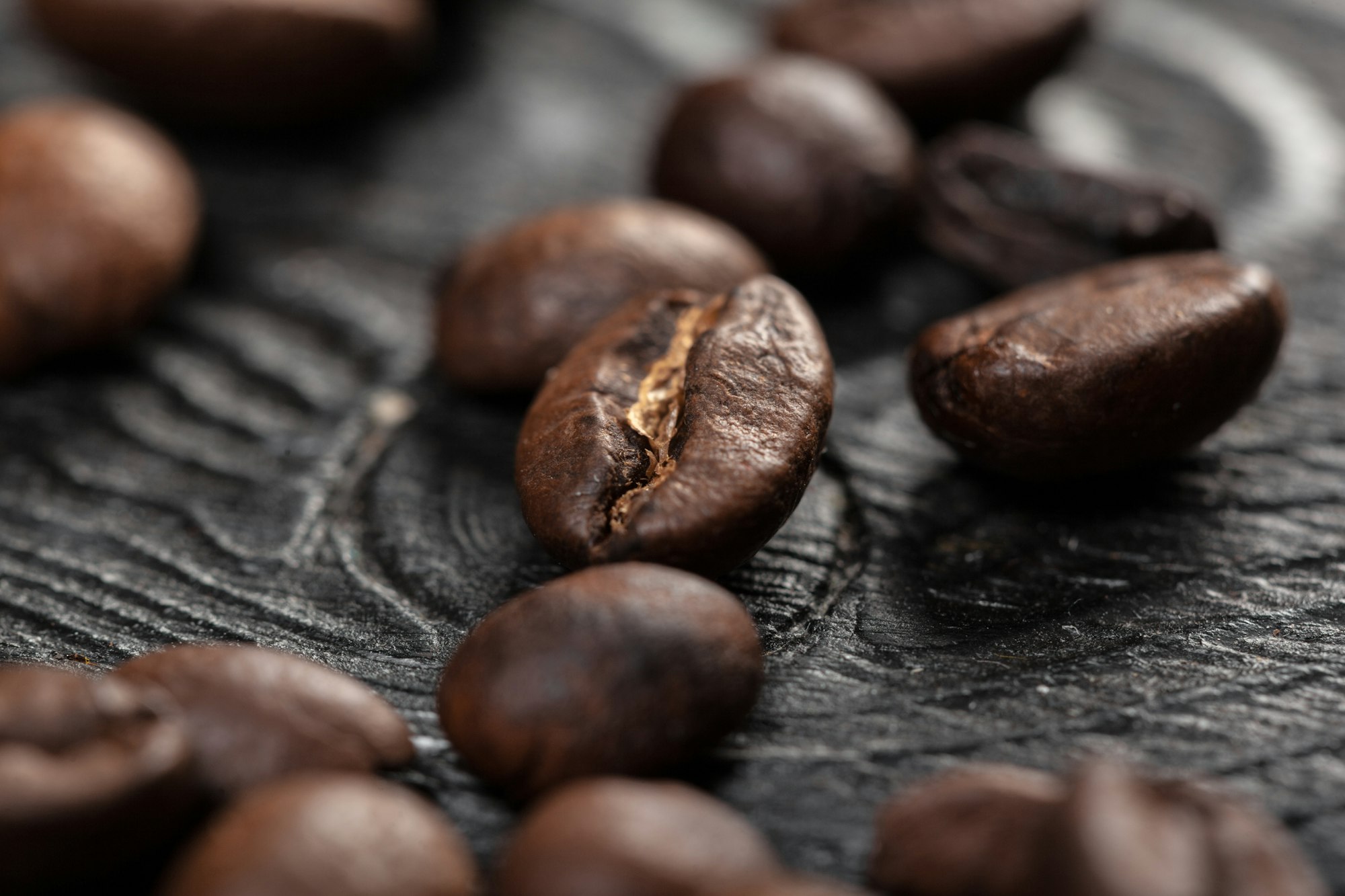 Coffee beans on wood background